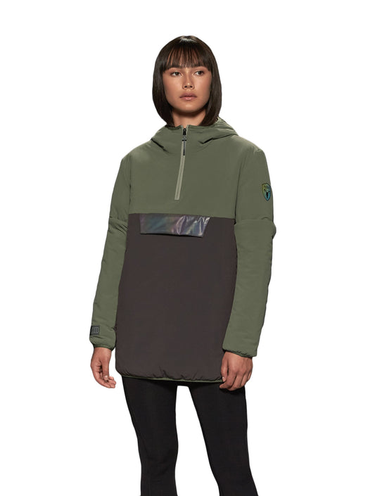 Unisex thigh length hooded anorak with vertical zipper along collar, side zippers along torso, and centre zipper pouch with a reflective flap, in Dusty Olive/Licorice + Dusty Olive/Licorice