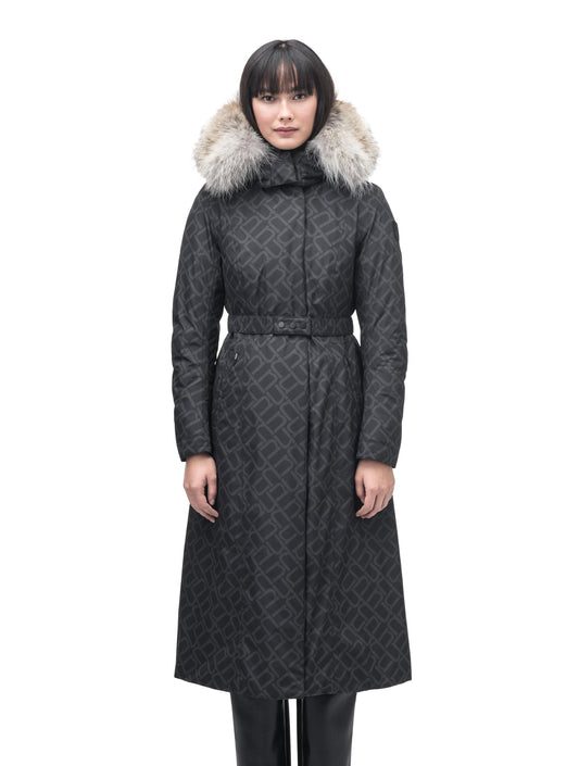 Celest Ladies Duster Parka in knee length, Canadian duck down insulation, removable hood and coyote fur trim, with adjustable belt, in Dark Monogram + Dark Monogram