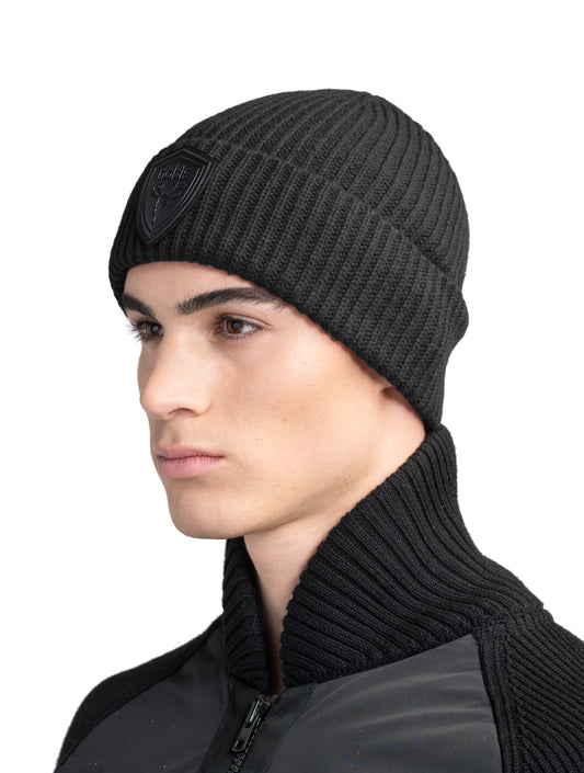 Emer Unisex Tailored Chunky Knit Beanie in extra fine merino wool blend, and black leather Nobis shield logo on cuff, in Black + Black
