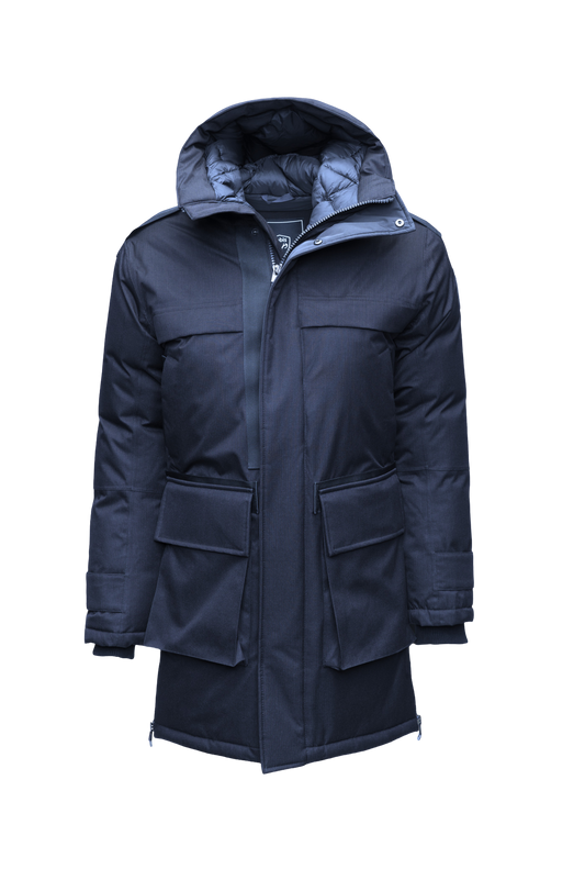 Alum Men's Long Parka in thigh length, Premium Canadian White Duck Down insulation, non-removable hood with removable coyote fur trim, two-way centre front zipper with magnetic closure wind flap, four exterior patch pockets at front, in Navy + Navy