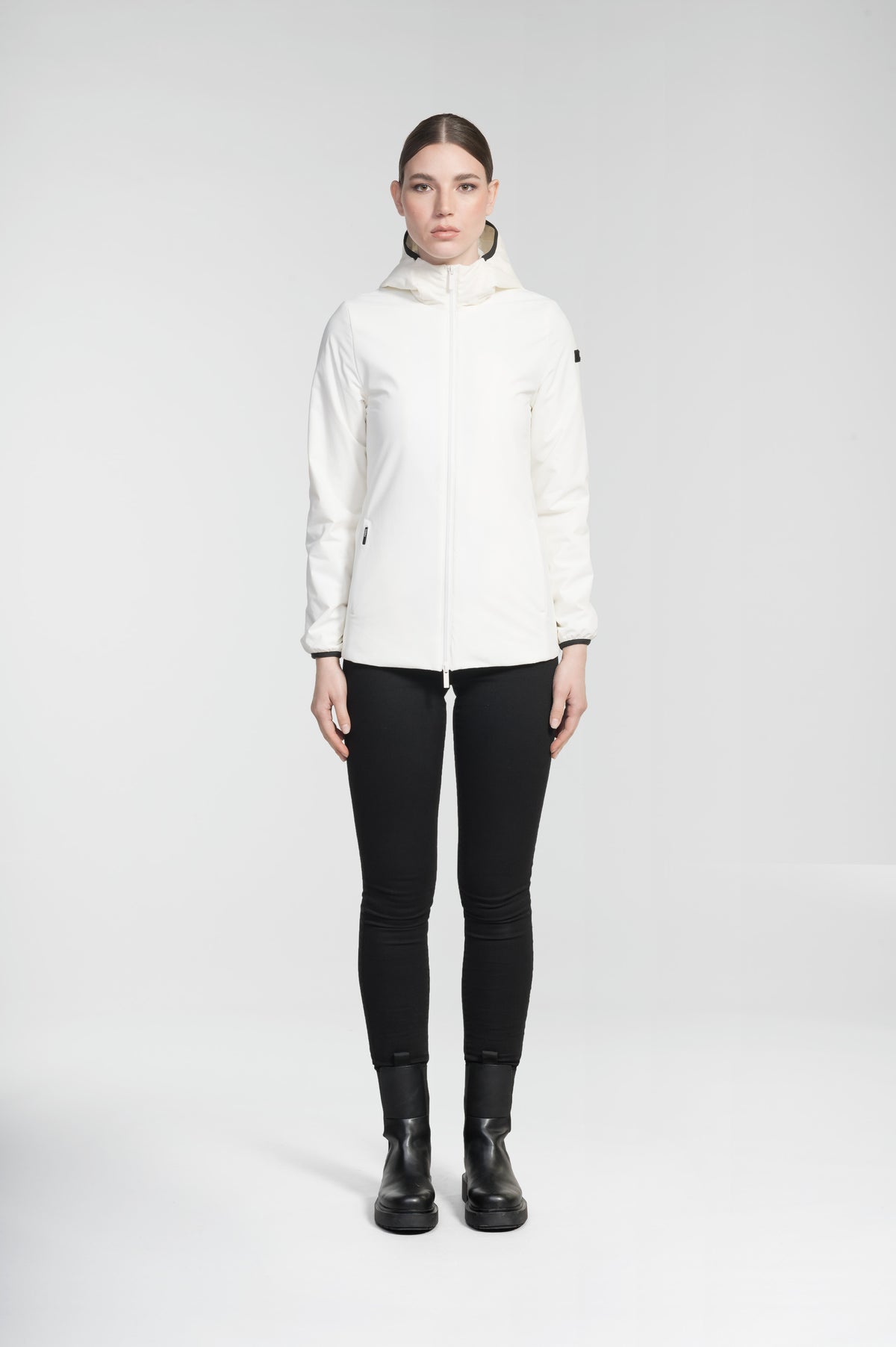 Ladies hip length mid layer jacket with non-removable hood and two-way zipper in Chalk