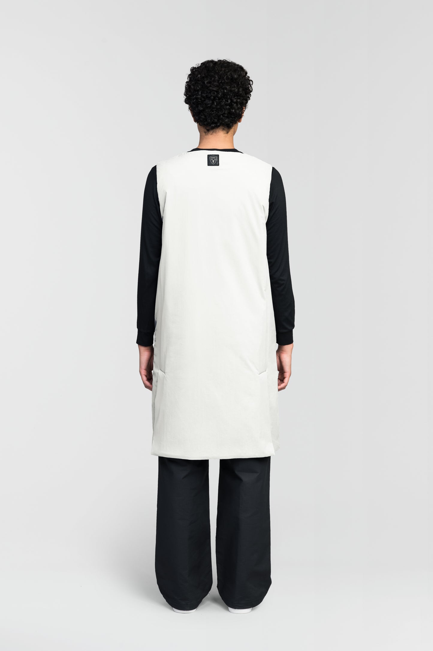 Brexton Women's Tailored Long Mid Layer Vest in knee length, centre front wind flap, flap closure waist pocket with additional side entry storage, single vent on back bottom hem, in Chalk