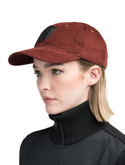 arter Unisex Tailored Ball Cap in 100% cotton corduroy, unstructured crown, curved brim, and leather strap back with metal buckle closure, in Rio Red