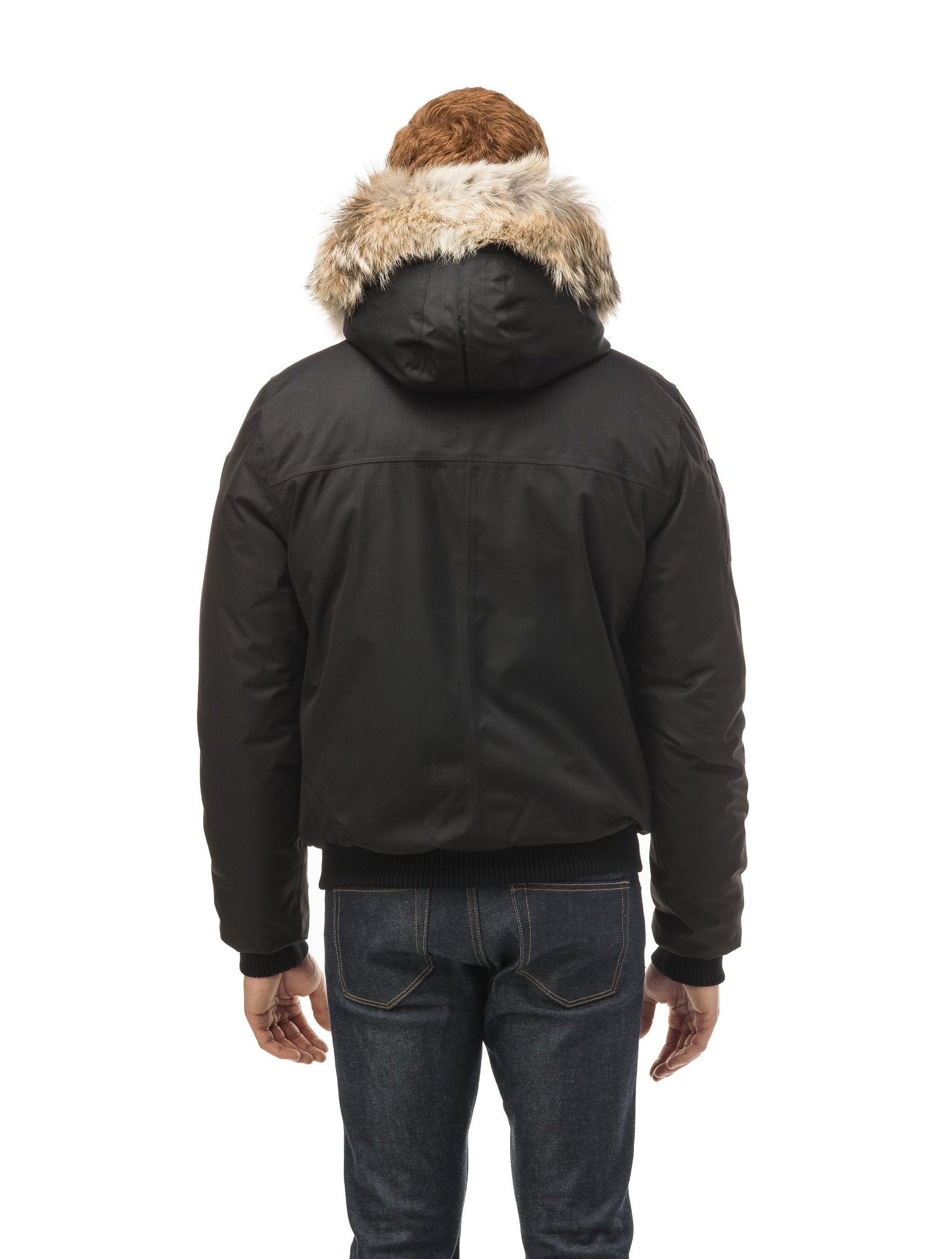 Men's classic down filled bomber jacket with a down filledÃƒÆ’Ã†â€™Ãƒâ€ Ã¢â‚¬â„¢ÃƒÆ’Ã‚Â¢ÃƒÂ¢Ã¢â‚¬Å¡Ã‚Â¬Ãƒâ€¦Ã‚Â¡ÃƒÆ’Ã†â€™ÃƒÂ¢Ã¢â€šÂ¬Ã…Â¡ÃƒÆ’Ã¢â‚¬Å¡Ãƒâ€šÃ‚Â hood that features a removable coyote fur trim and concealed moldable framing wire in Black