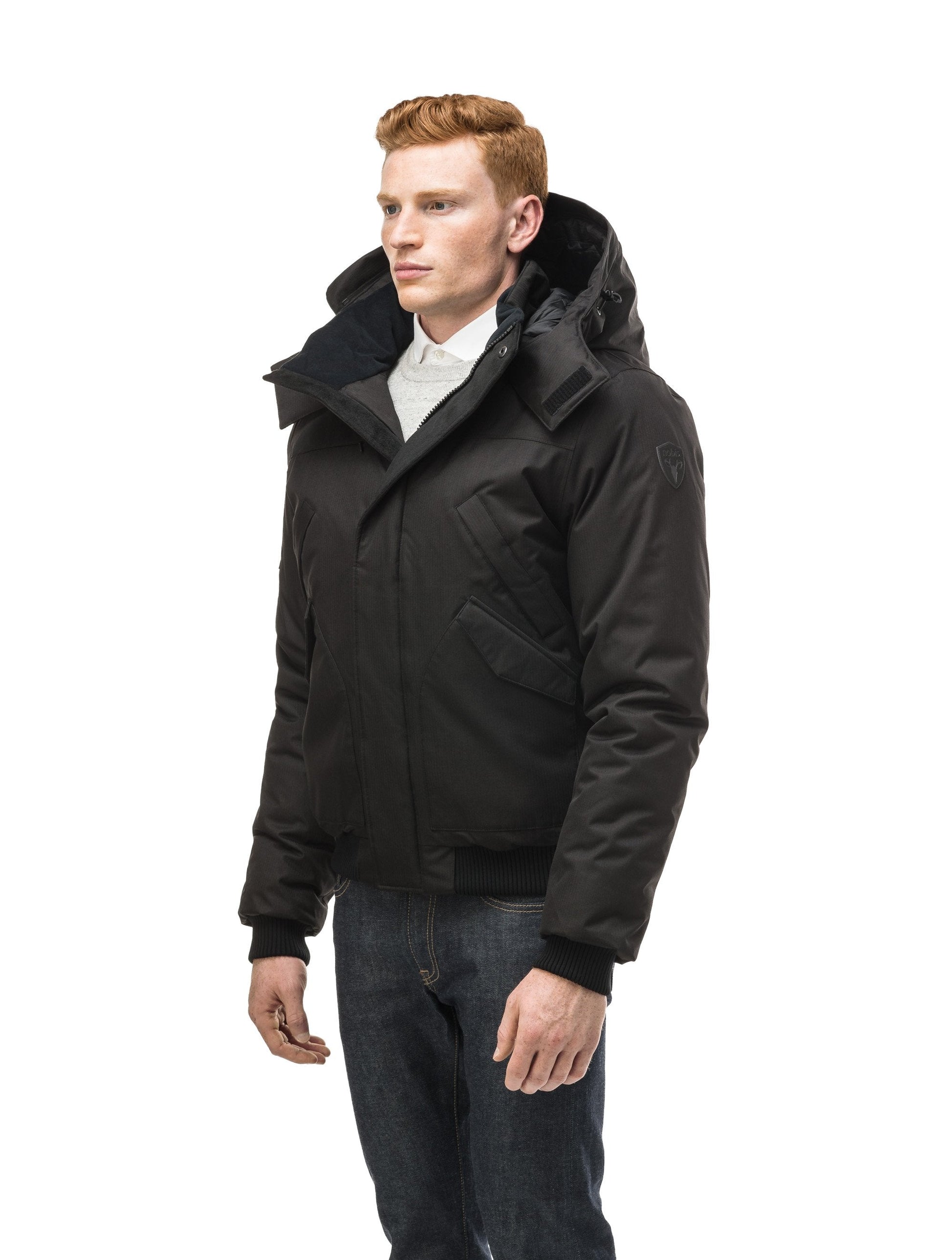 Men's classic down filled bomber jacket with a down filledÃƒÆ’Ã†â€™Ãƒâ€ Ã¢â‚¬â„¢ÃƒÆ’Ã‚Â¢ÃƒÂ¢Ã¢â‚¬Å¡Ã‚Â¬Ãƒâ€¦Ã‚Â¡ÃƒÆ’Ã†â€™ÃƒÂ¢Ã¢â€šÂ¬Ã…Â¡ÃƒÆ’Ã¢â‚¬Å¡Ãƒâ€šÃ‚Â hood that features a removable coyote fur trim and concealed moldable framing wire in Black