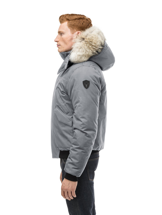 Men's classic down filled bomber jacket with a down filledÃƒÆ’Ã†â€™Ãƒâ€ Ã¢â‚¬â„¢ÃƒÆ’Ã‚Â¢ÃƒÂ¢Ã¢â‚¬Å¡Ã‚Â¬Ãƒâ€¦Ã‚Â¡ÃƒÆ’Ã†â€™ÃƒÂ¢Ã¢â€šÂ¬Ã…Â¡ÃƒÆ’Ã¢â‚¬Å¡Ãƒâ€šÃ‚Â hood that features a removable coyote fur trim and concealed moldable framing wire in Concrete + Concrete