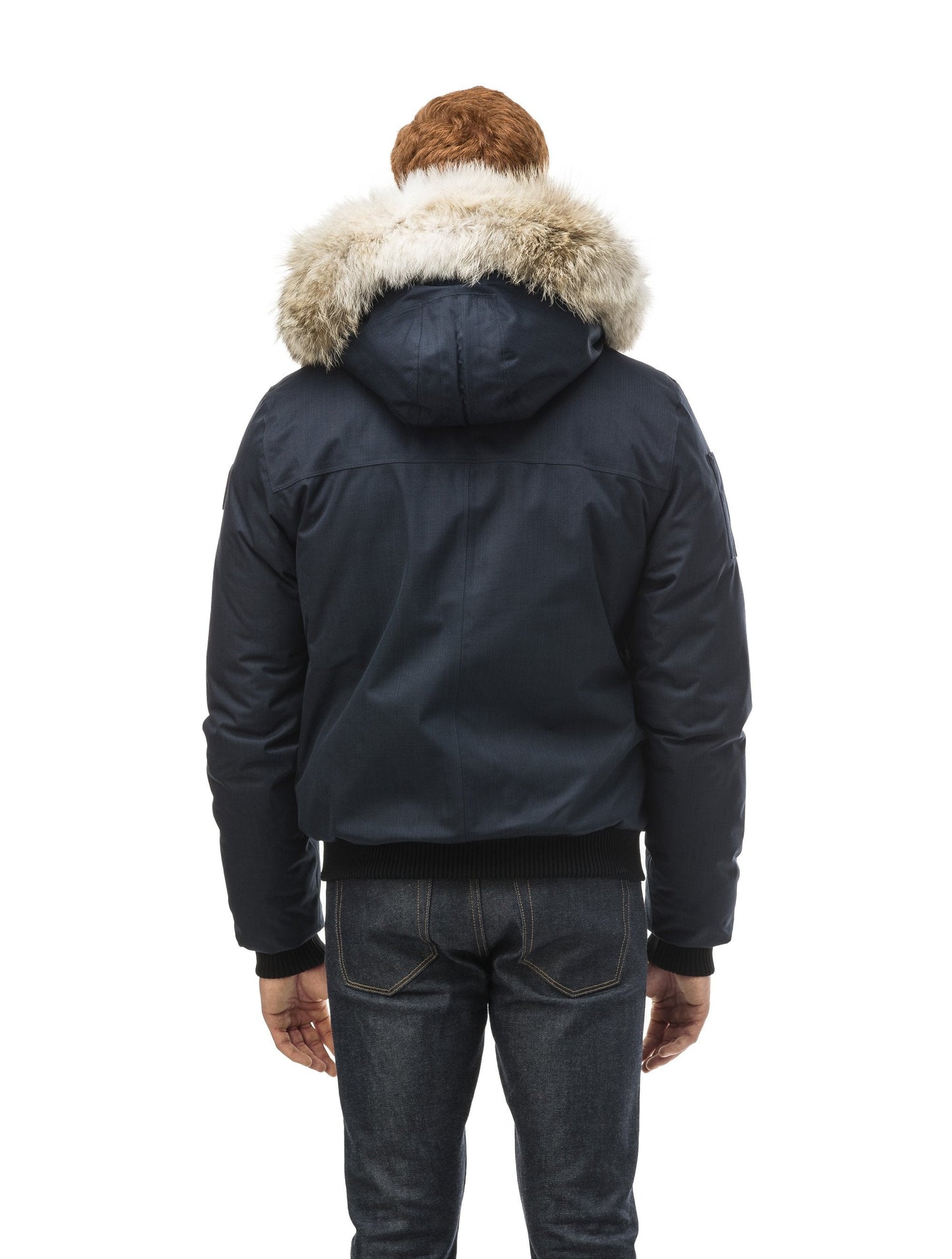 Men's classic down filled bomber jacket with a down filledÃƒÆ’Ã†â€™Ãƒâ€ Ã¢â‚¬â„¢ÃƒÆ’Ã‚Â¢ÃƒÂ¢Ã¢â‚¬Å¡Ã‚Â¬Ãƒâ€¦Ã‚Â¡ÃƒÆ’Ã†â€™ÃƒÂ¢Ã¢â€šÂ¬Ã…Â¡ÃƒÆ’Ã¢â‚¬Å¡Ãƒâ€šÃ‚Â hood that features a removable coyote fur trim and concealed moldable framing wire in Navy