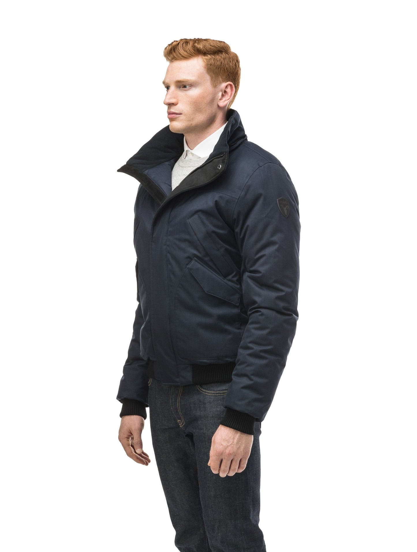 Men's classic down filled bomber jacket with a down filledÃƒÆ’Ã†â€™Ãƒâ€ Ã¢â‚¬â„¢ÃƒÆ’Ã‚Â¢ÃƒÂ¢Ã¢â‚¬Å¡Ã‚Â¬Ãƒâ€¦Ã‚Â¡ÃƒÆ’Ã†â€™ÃƒÂ¢Ã¢â€šÂ¬Ã…Â¡ÃƒÆ’Ã¢â‚¬Å¡Ãƒâ€šÃ‚Â hood that features a removable coyote fur trim and concealed moldable framing wire in Navy