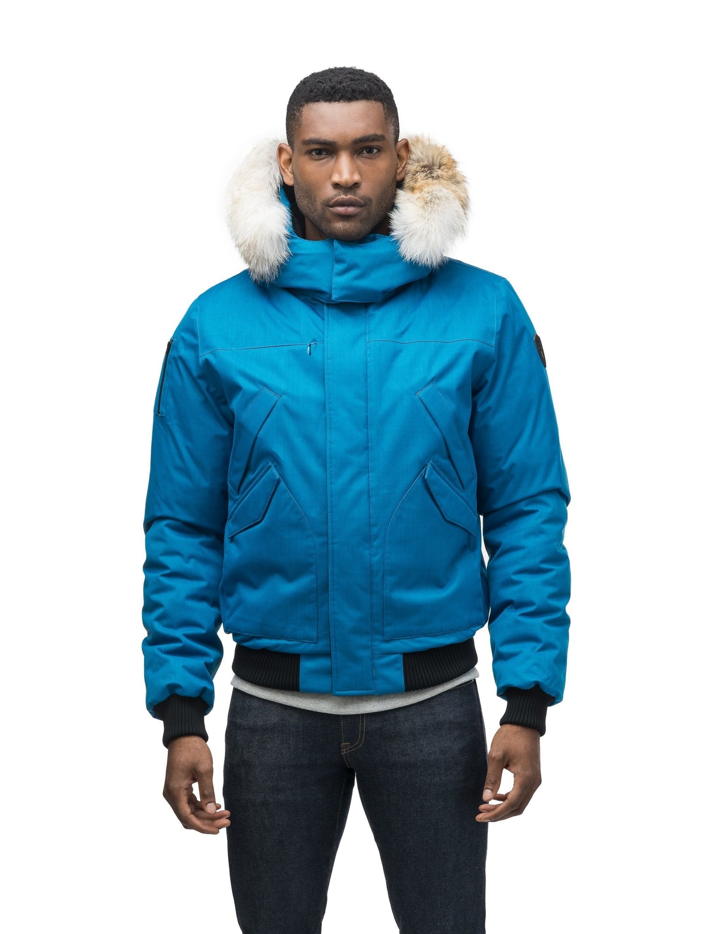 Men's classic down filled bomber jacket with a down filledÃƒÆ’Ã†â€™Ãƒâ€ Ã¢â‚¬â„¢ÃƒÆ’Ã‚Â¢ÃƒÂ¢Ã¢â‚¬Å¡Ã‚Â¬Ãƒâ€¦Ã‚Â¡ÃƒÆ’Ã†â€™ÃƒÂ¢Ã¢â€šÂ¬Ã…Â¡ÃƒÆ’Ã¢â‚¬Å¡Ãƒâ€šÃ‚Â hood that features a removable coyote fur trim and concealed moldable framing wire in Sea Blue