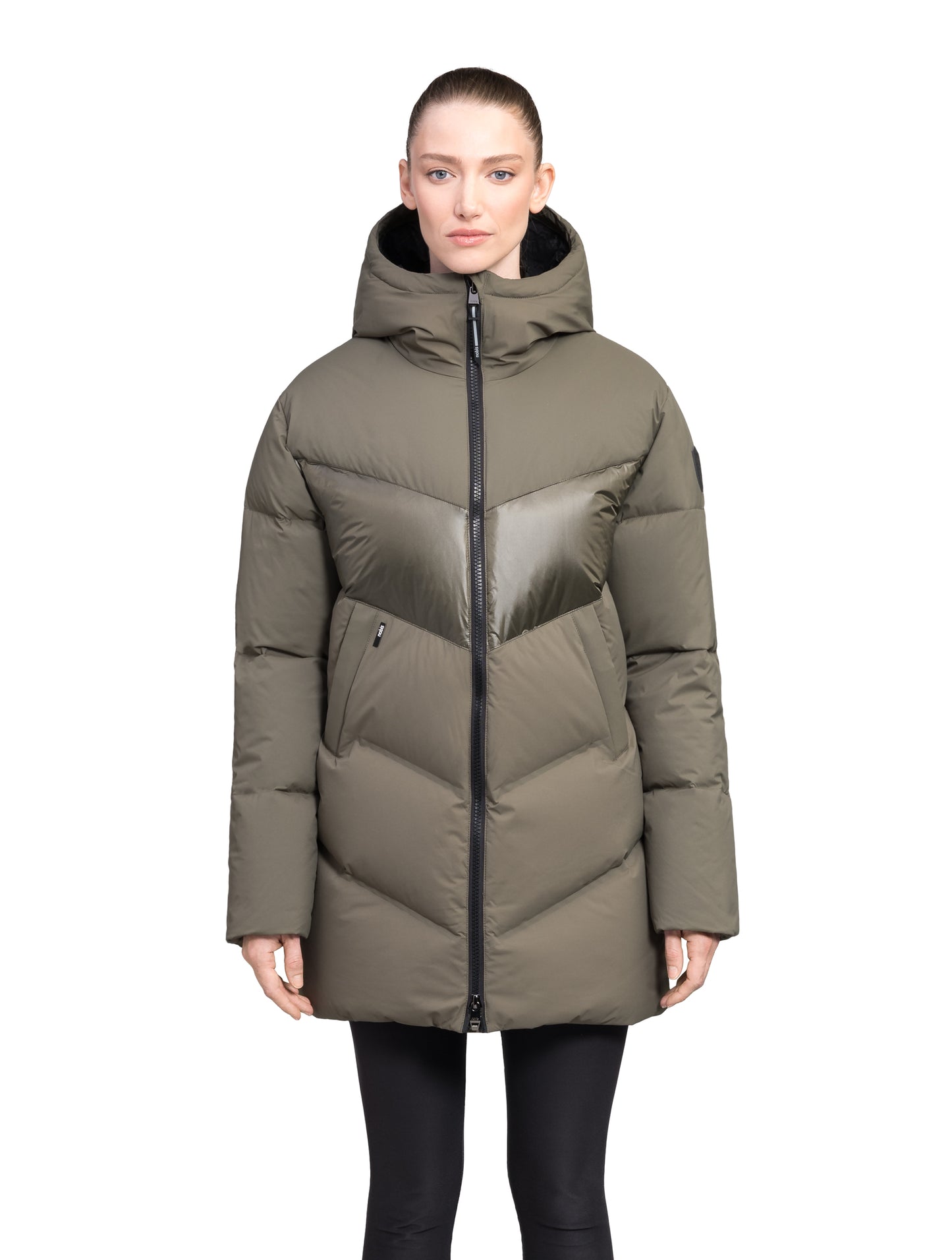 Isla Women's Chevron Quilted Puffer Jacket in thigh length, premium technical nylon taffeta fabrication, Premium Canadian origin White Duck Down insulation, non-removable down-filled hood, two-way centre-front zipper, zipper pockets at waist, contrast cire technical nylon taffeta detailing on chest and back, in Fatigue