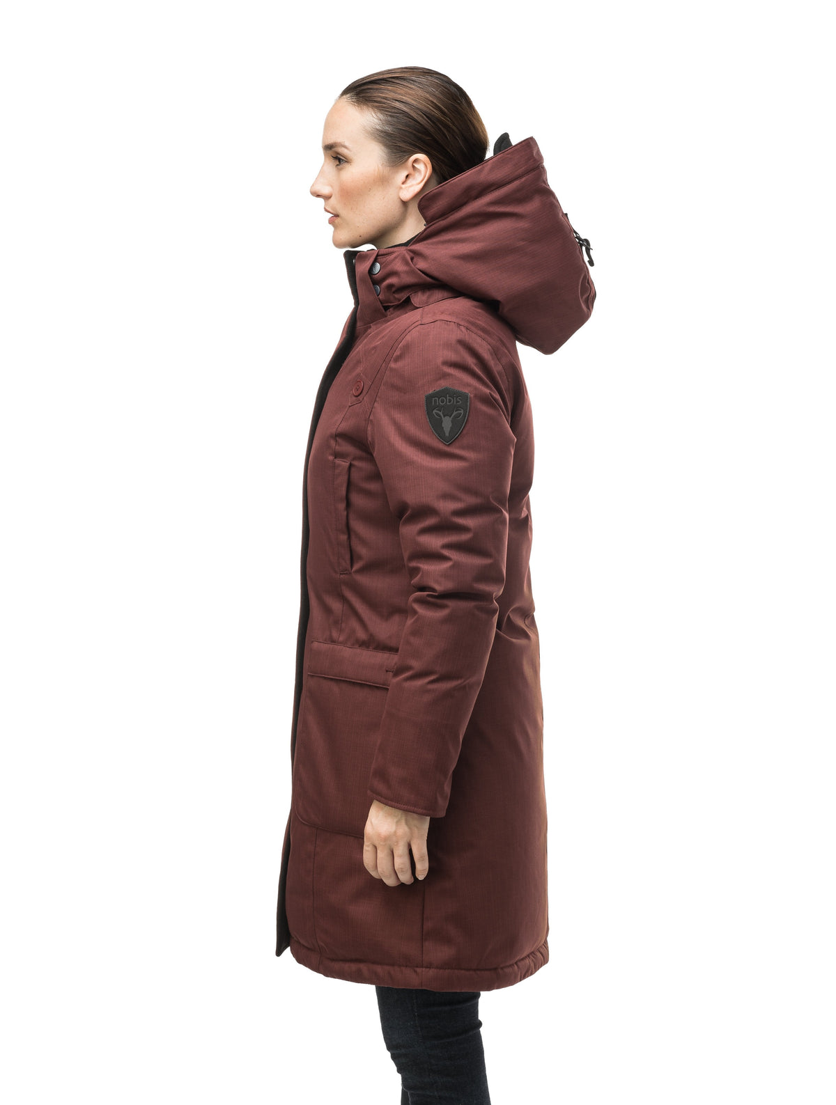 Best selling women's down filled knee length parka with removable down filled hood in Rum