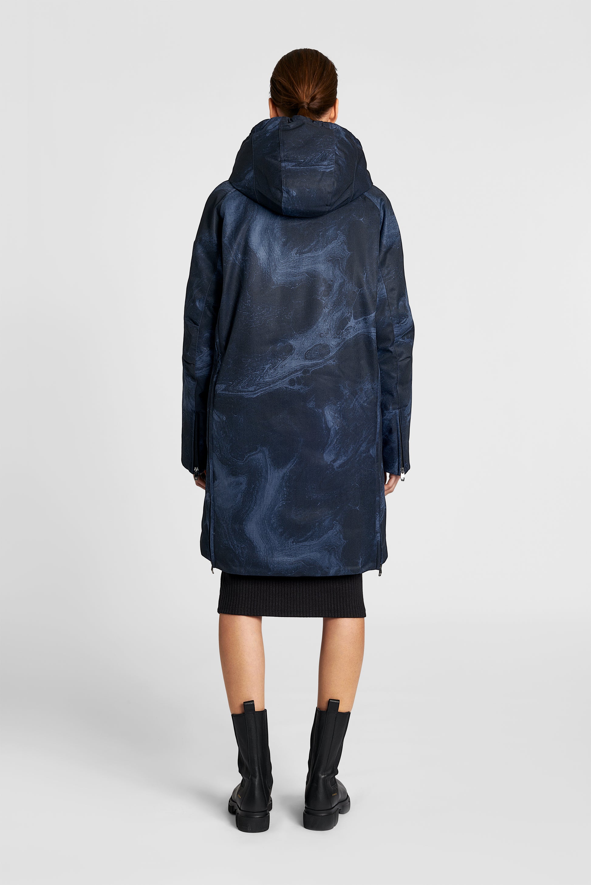 Dory Women's Tailored Back Zip Parka in knee length, premium Crosshatch fabrication, Premium Canadian White Duck Down insulation, non-removable down-filled hood, removable interior hood, centre front two-way zipper with wind flap, vertical zipper detailing along back, in Navy