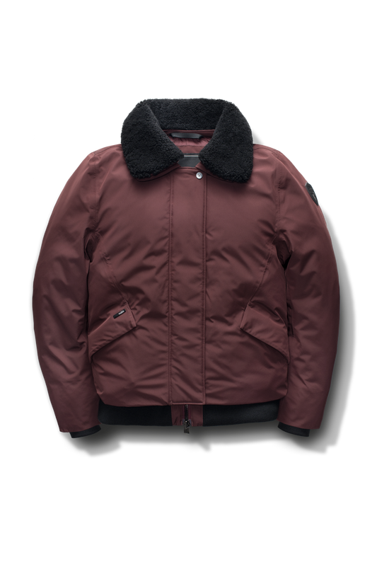 Rae Ladies Aviator Jacket in hip length, Canadian duck down insulation, removable shearling collar with hidden tuckable hood, and two-way front zipper, in Merlot + Merlot