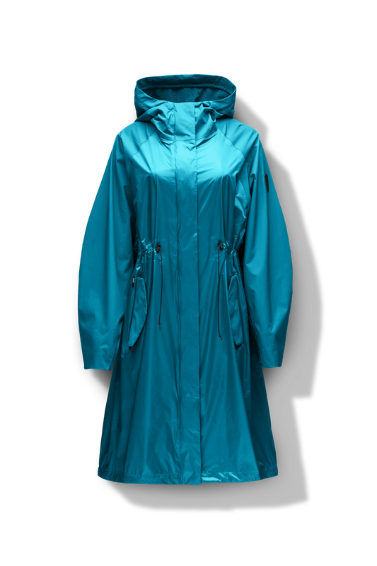 premium strech ripstop and contrast cire technical nylon taffeta fabrication, non-removable hood with adjustable draw cord, waist flap pockets with magnetic closures, adjustable draw cords at waist and bottom hem, adjustable snap cuffs, mesh back ventilation, hidden packable pocket, snap button wind flap, two-way branded zipper at centre front, adjustable snap button fishtail yoke at back, and large interior zipper pocket, in Marine + Deep Lake