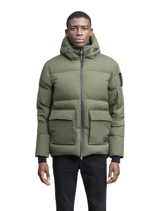 Supra Men's Performance Puffer in hip length, Technical Taffeta and 3-Ply Micro Denier fabrication, Premium Canadian White Duck Down insulation, non-removable down filled hood, centre front two-way zipper, flap pockets at waist, and zipper pocket at left bicep, in Clover + Clover / XS