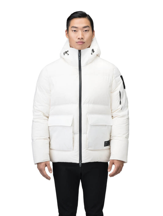 Supra Men's Performance Puffer in hip length, Technical Taffeta and 3-Ply Micro Denier fabrication, Premium Canadian White Duck Down insulation, non-removable down filled hood, centre front two-way zipper, flap pockets at waist, and zipper pocket at left bicep, in Wheat Desert + Wheat Desert / XS