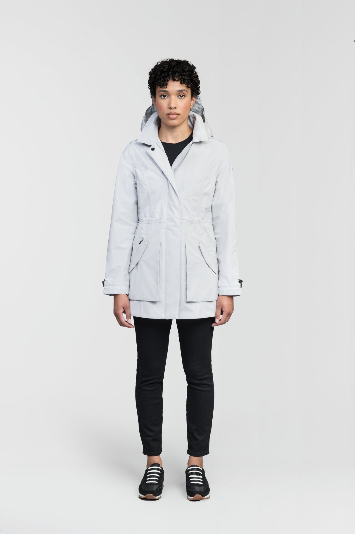 Women's thigh length raincoat with collar and non-removable hood in Light Grey