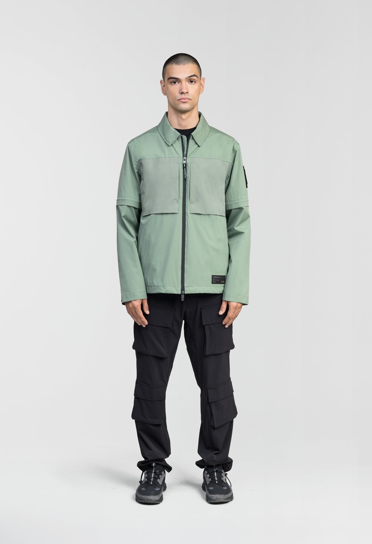 Thurlow Men's Performance Zip Off Sleeve Rain Shirt in hip length, convertible collar, patch chest zipper pockets, hidden in-seam pockets, zip off sleeves, centre front two-way zipper closure, in Duck Green