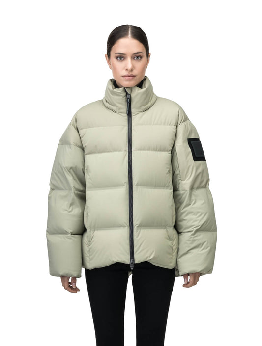 Una Ladies Performance Puffer in hip length, Technical Taffeta and Durable Stretch Ripstop fabrication, Premium Canadian White Duck Down insulation, removable down filled hood, centre front two-way zipper, and side-entry pockets at waist, in Tea + Tea / XXS