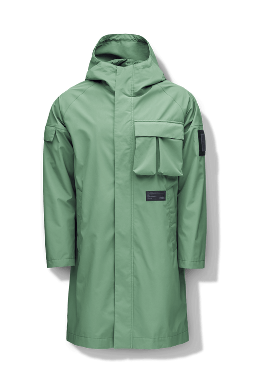 Wylder Men's Performance Rain Jacket in knee length, premium 3-ply Micro Denier and stretch ripstop fabrication, non-removable hood with reflective piping and adjustable draw cord, split utility chest pocket with magnetic flap closure, single welt pockets with magnetic closure at waist, back yoke with mesh ventilation, snap button wind flap, two-way branded zipper at centre front, telescopic sleeves with elasticized cuffs, interior draw cord at waist, in Comfrey + Comfrey