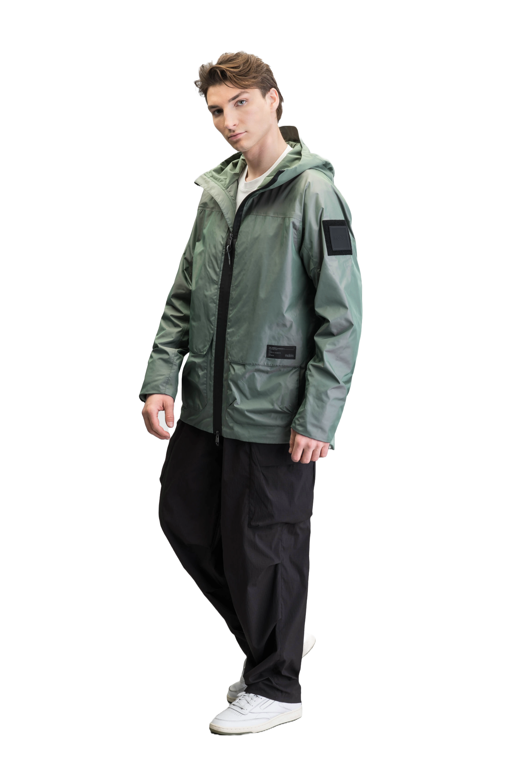 Mission Men's Performance Rain Shell Jacket in hip length, non-removable hood with adjustable toggle, two-way waterproof zipper, flap closure waist pockets with additional side entry storage, zipper ventilation on back, passive underarm ventilation, and breathable mesh lining, in Duck Green