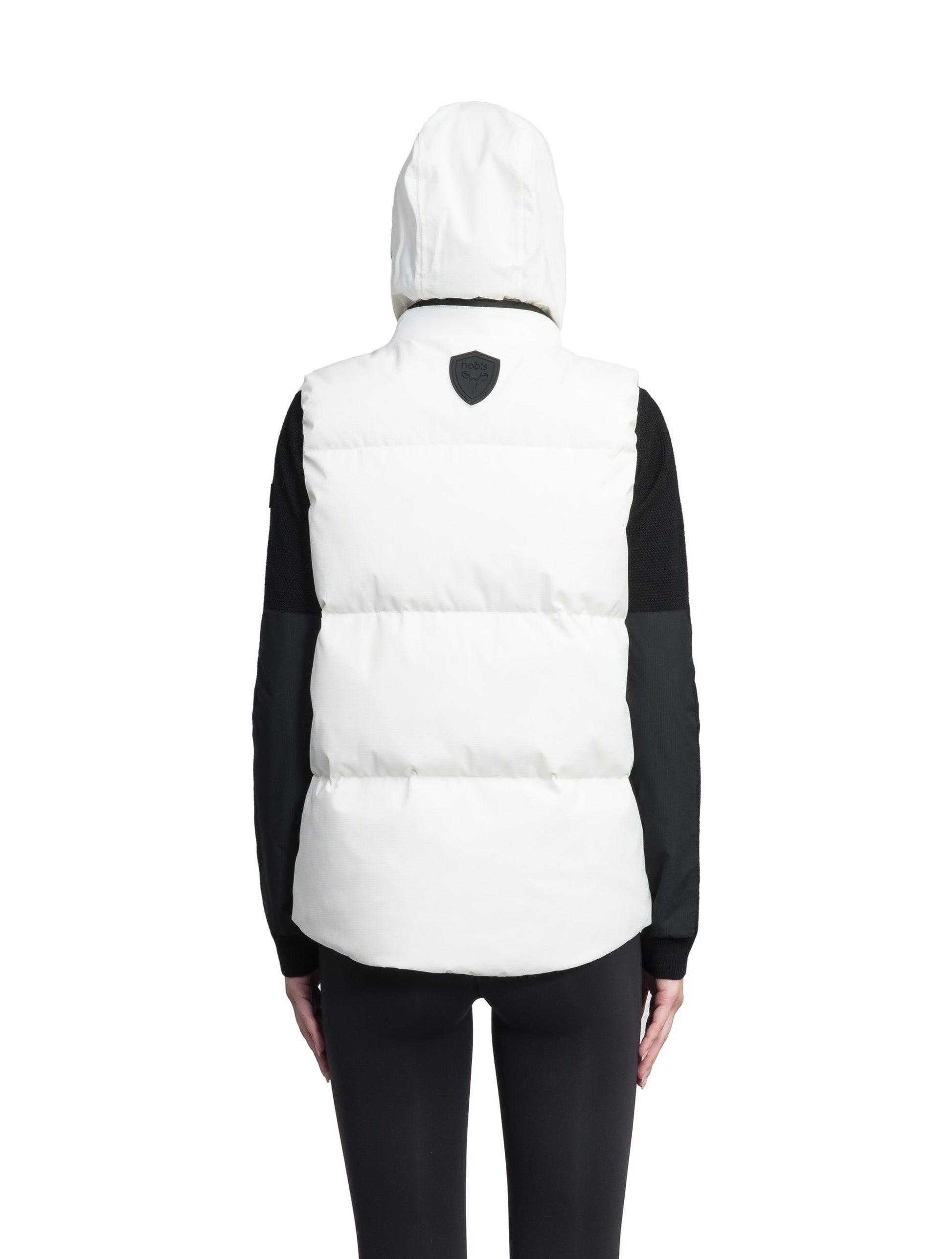 Oren Ladies Performance Vest in hip length, Durable Stretch Ripstop and 3-Ply Micro Denier fabrication, Premium Canadian White Duck Down insulation, tuck-away waterproof hood, and two-way centre front zipper, in Chalk