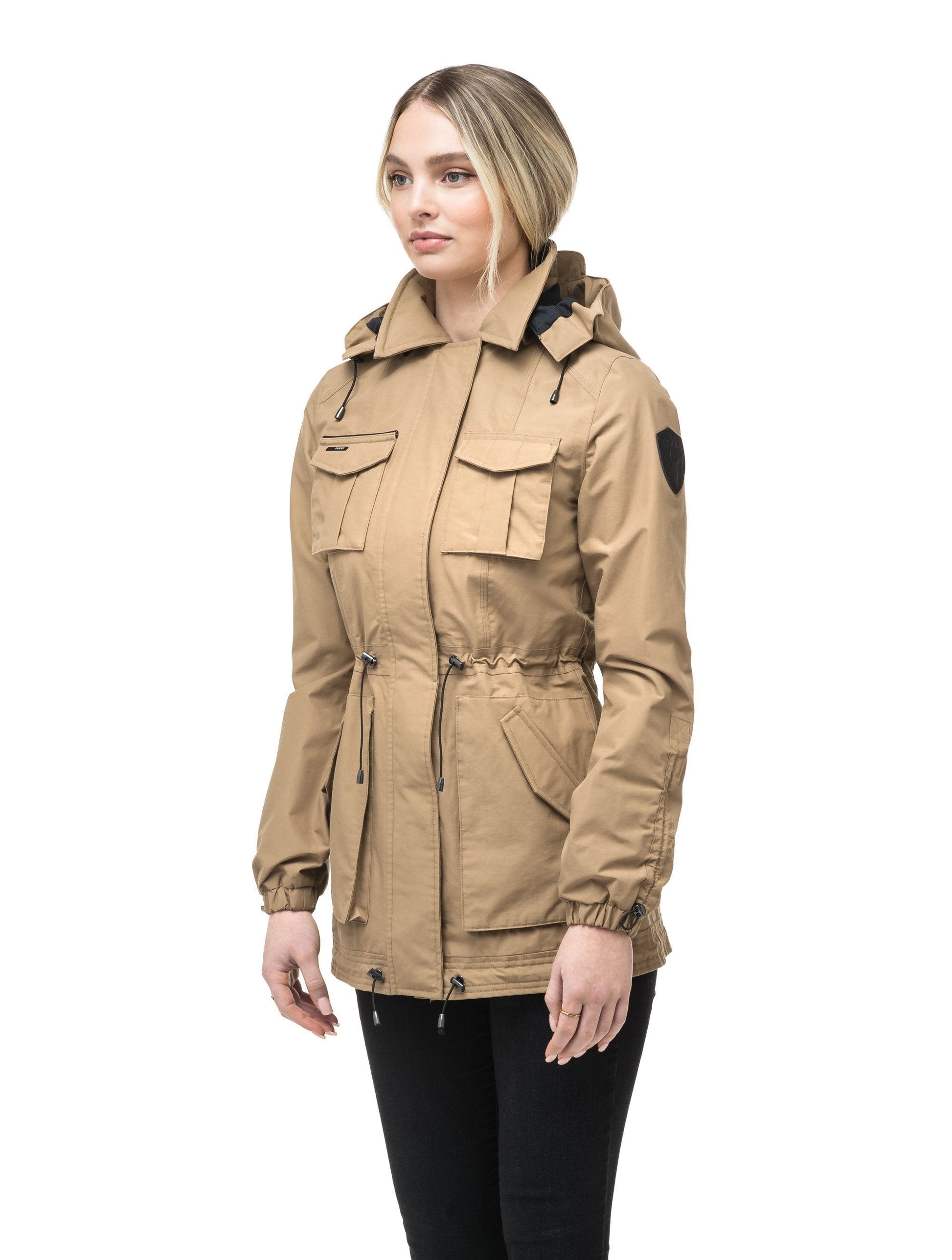 Women's hooded shirt jacket with four front pockets and adjustable waist in Cork