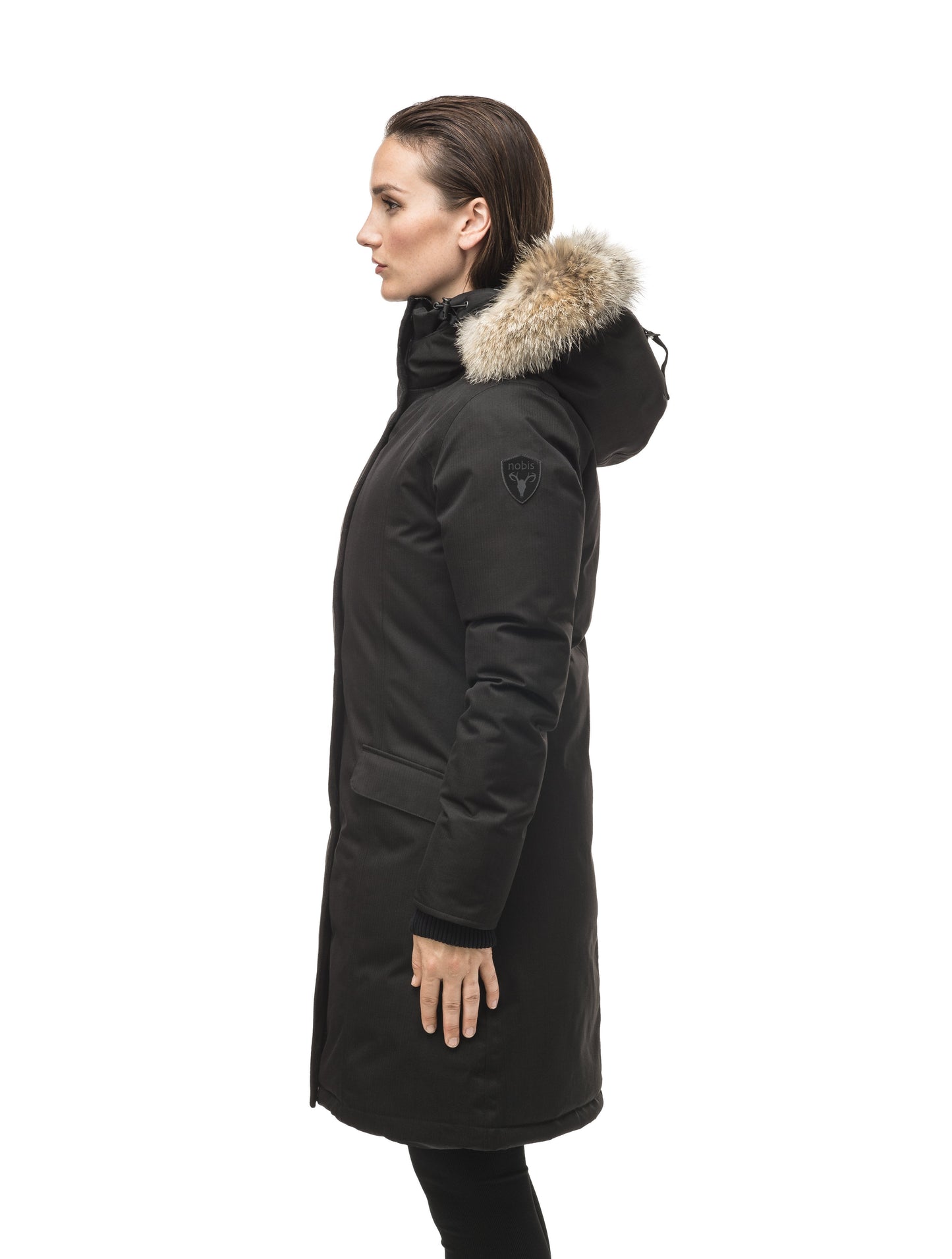 Rebecca Women's Parka in knee length, Canadian duck down insulation, two-way zipper with magnetic front placket, non-removable hood with removable coyote fur trim, in Black