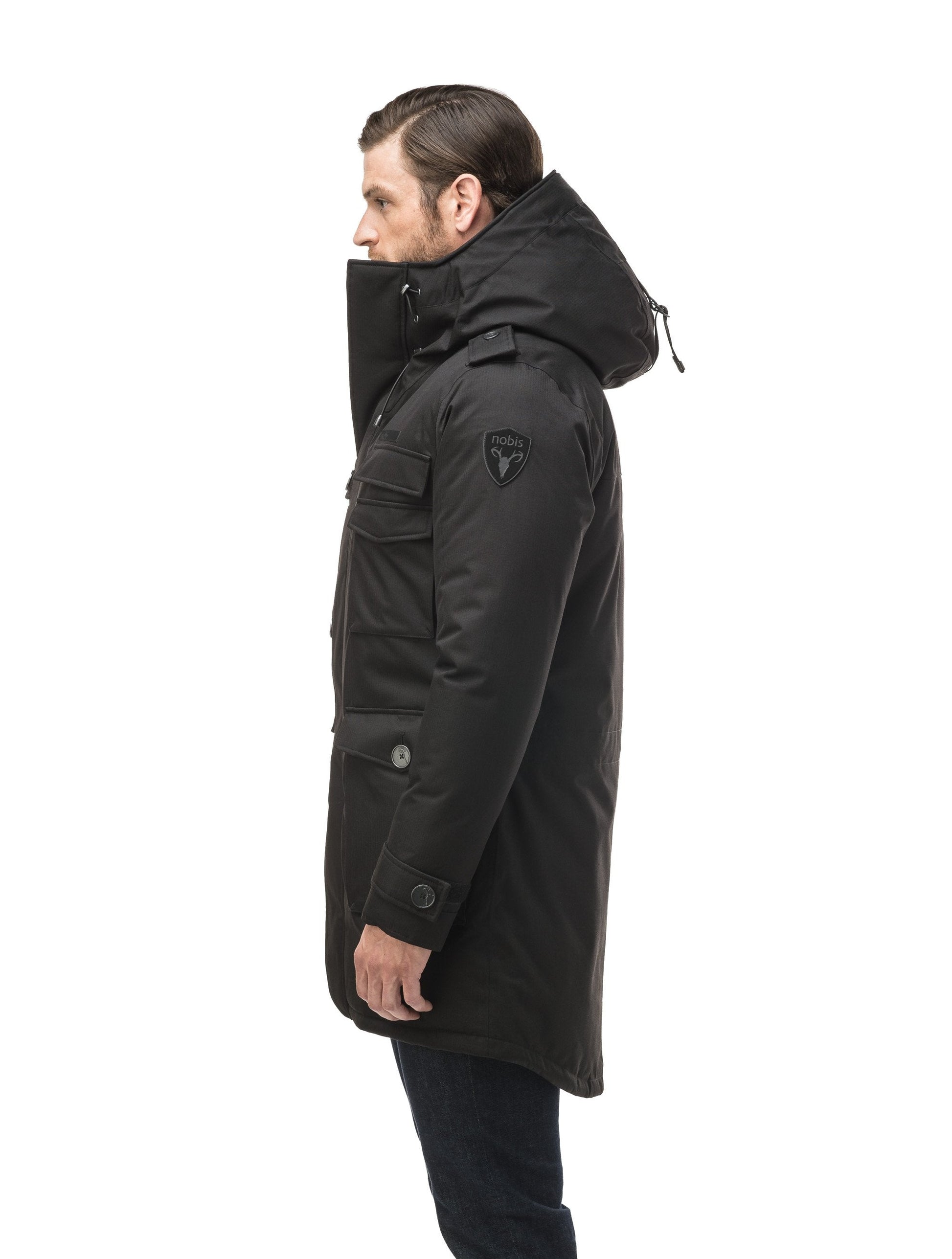 Men's down filled parka with faux button magnet closures and fur free hood with a fishtail hemline in Black