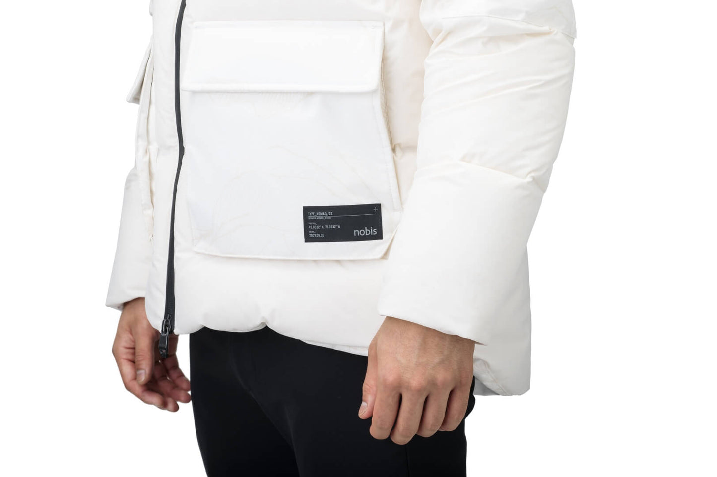 Supra Men's Performance Puffer in hip length, Technical Taffeta and 3-Ply Micro Denier fabrication, Premium Canadian White Duck Down insulation, non-removable down filled hood, centre front two-way zipper, flap pockets at waist, and zipper pocket at left bicep, in Wheat Desert
