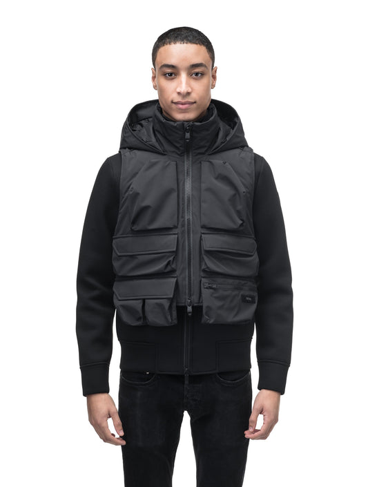 Vulcan Unisex Tactical Vest in waist length, Primaloft Gold Insulation Active, non-removable hood, removable face mask, seven pockets on front and back, and two-way front zipper, in Black + Black