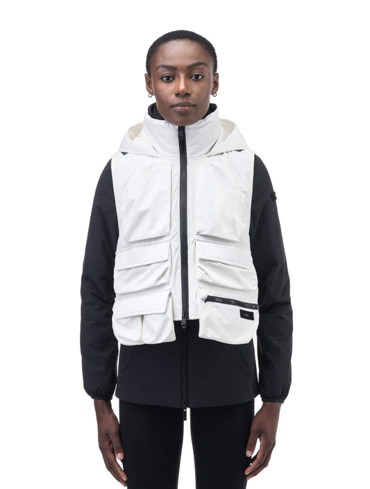 Vulcan Unisex Tactical Vest in waist length, Primaloft Gold Insulation Active, non-removable hood, removable face mask, seven pockets on front and back, and two-way front zipper, in Chalk + Chalk
