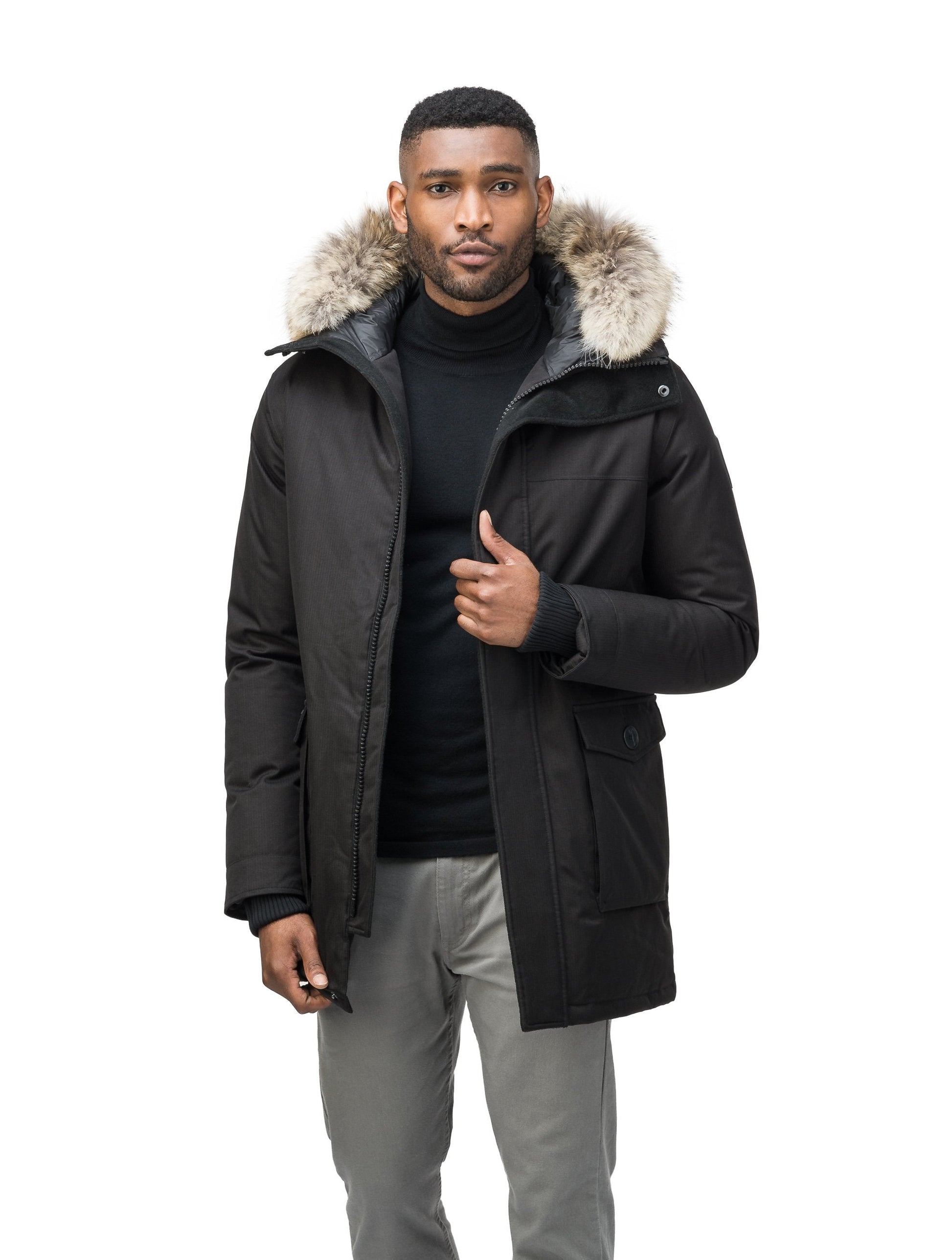 Men's slim fitting waist length parka with removable fur trim on the hood and two waist patch pockets in CH Black