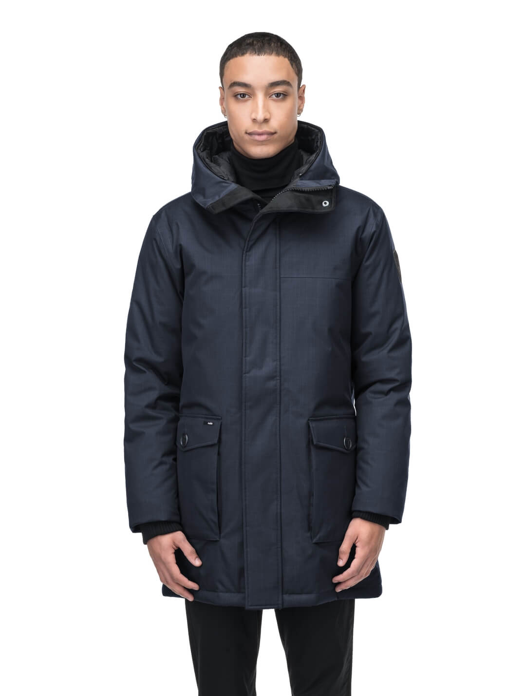 Men's slim fitting waist length parka with removable fur trim on the hood and two waist patch pockets in CH Navy